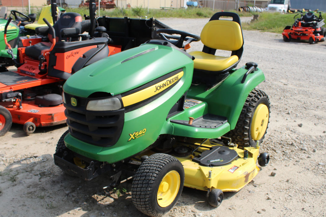 John Deere X Riding Mower T H E Company