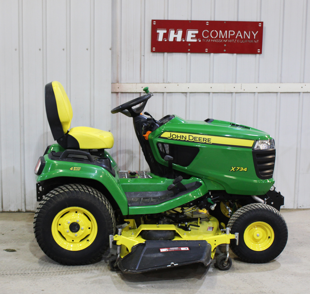 John Deere X734 Riding Lawn Mower - T.H.E. Company